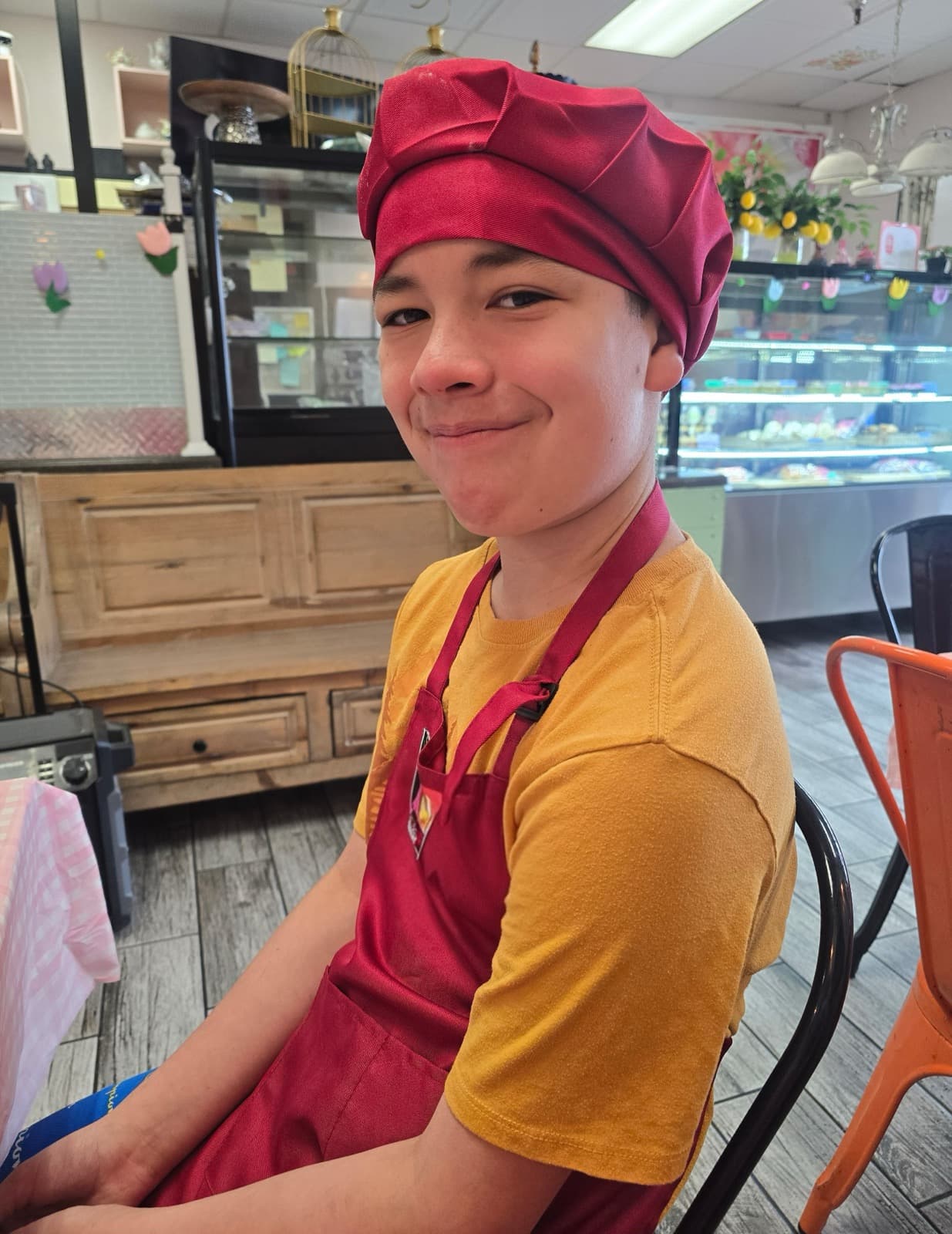 Tereyn's son helping out at a local bakery.